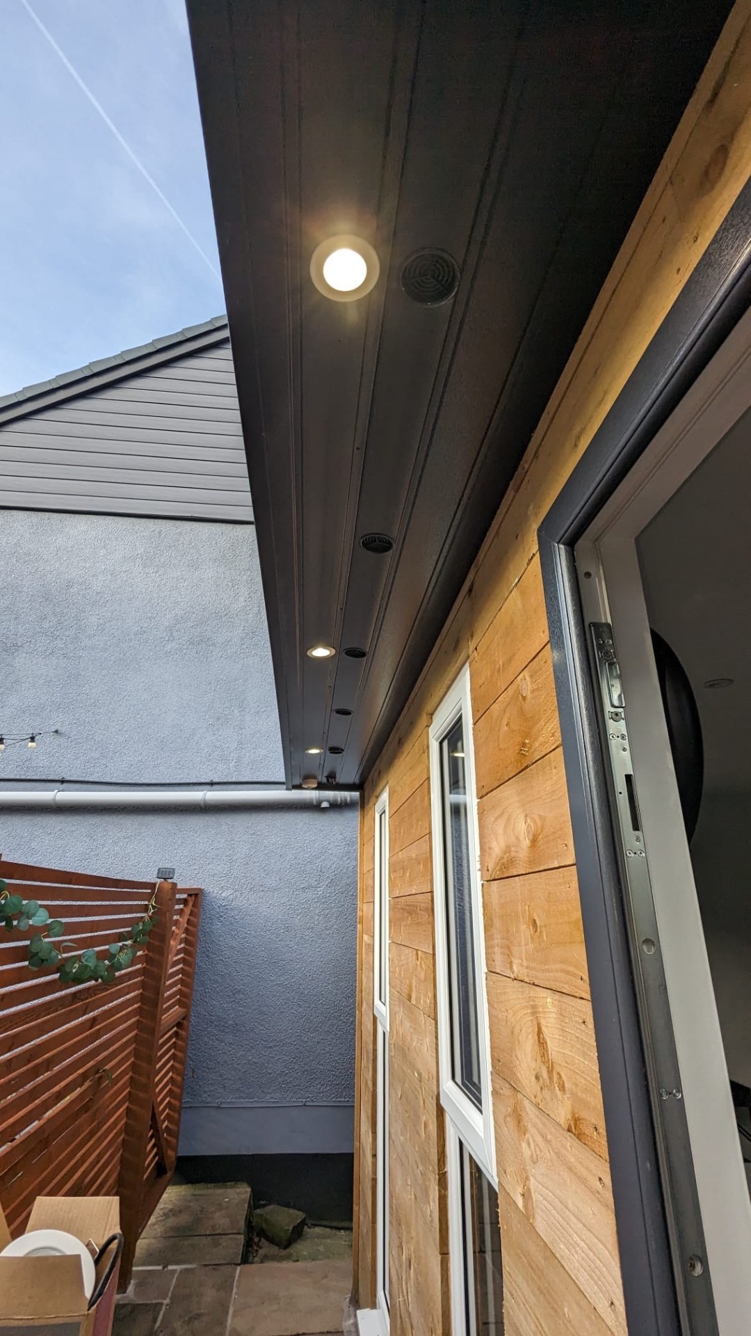 Exterior soffit downlights